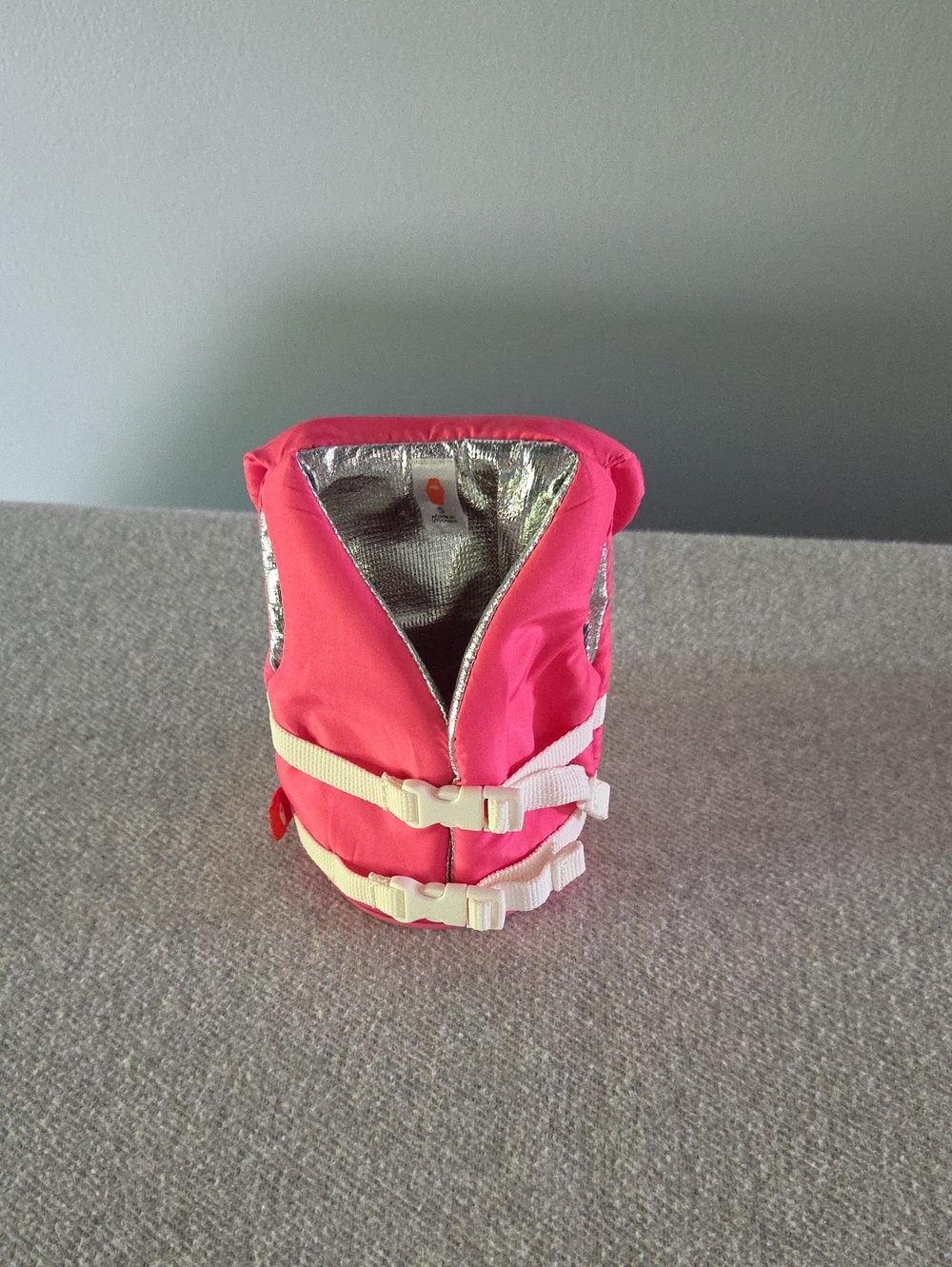 Puffin Insulated Can Or Bottle Holder. Pink Vest With Clip Opening & Closure.